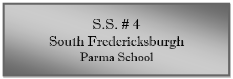 A grey rectangular sign with black text

Description automatically generated