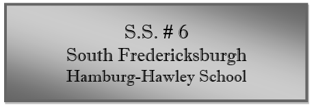 A close-up of a sign

Description automatically generated